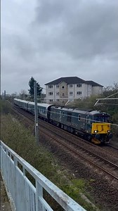 Caledonian sleeper class 73/9 (73968) passes Stirling bridge at speed with empty MK5 coaches