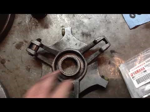 Repairing the primary clutch on a Yamaha Enticer