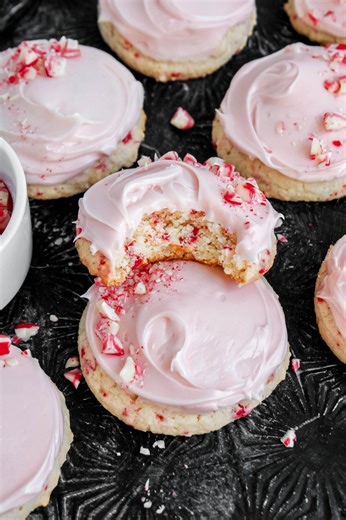 Peppermint Sugar Meltaway Cookies Cookies 1 pouch Betty Crocker™ Limited Edition Soft Baked Peppermint Sugar Cookie Mix 1/2 cup unsalted butter, softened 2 large eggs Frosting 1 tub (16 oz) Betty Crocker™ Rich & Creamy Vanilla Frosting 1 drop red gel food color from 1 box Betty Crocker™ Classic Gel Food Color 1/4 cup crushed candy canes See the full recipe: https://bit.ly/4rm4ORd | Betty Crocker