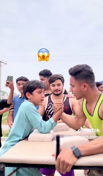 Arm Wrestling Challenge with a Confident Boy