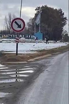 Daughter's Snowball Causes Dad to Slip in Snow