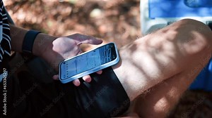 Close-up of man's hands using text messages on phone, browsing internet, pressing scroll, scrolling up social media, browsing technology app isolated.