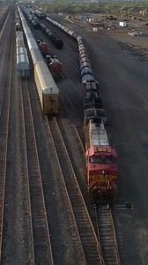 𝕎𝕒𝕣𝕓𝕠𝕟𝕟𝕖𝕥 𝕊𝕙𝕦𝕗𝕗𝕝𝕖 · #BNSF714 works a cut of train back into the Lubbock yard in her classic red and silver Santa Fe colors. (Note the Santa Fe nose as well.) #bnsf #warbonnet #dash9 #santafe #railroad #railway #railfan #train #trains #trainsofinstagram #trains_worldwide #photography #dronephotography #DroneVideo #lubbock #texas | TBB'S TRAINS