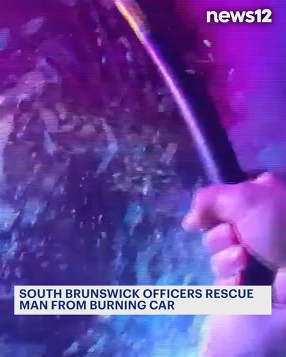 BODY CAM FOOTAGE: The footage that has been released shows South Brunswick officers smashing through the windows of a burning car to pull a driver out. https://bit.ly/4r2njtB | News 12 New Jersey