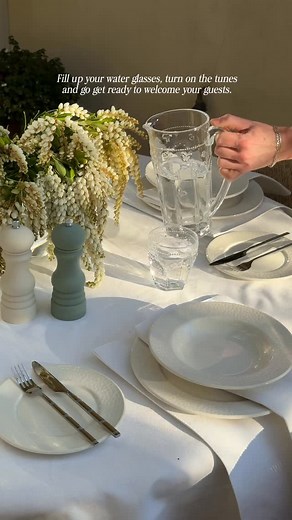 Loui Burke on Instagram: "Serving up a chic summer tablescape ️ The trick? Layers of crisp white linen, beautiful dinnerware and textured glassware by Pure Tabletop, and a few thoughtful details. Fresh, elevated, and proof that style doesn’t have to blow the budget. Turn on the tunes, top up the glasses, and you’re ready to host. #Tablescape #SummerEntertaining"
