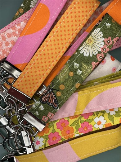 I’m working on lots of new items for spring markets! These keychains can be mixed or matched with wallets I’ll be making soon 🌼 #smallbuisness #handmade #sewing #sewingtiktok