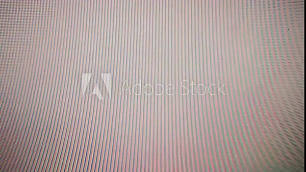 analog VHS video noise texture with horizontal lines and flickering distortion. The image shows a vintage television screen effect with static, interference, and scanlines.