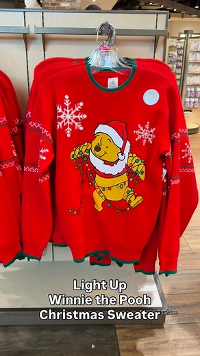 1K views · 104 reactions | Winnie the Pooh knows how to light up a room!  Winnie the Pooh light up Christmas sweater at World of Disney for $89.99 | The Disney Fashionista | Facebook