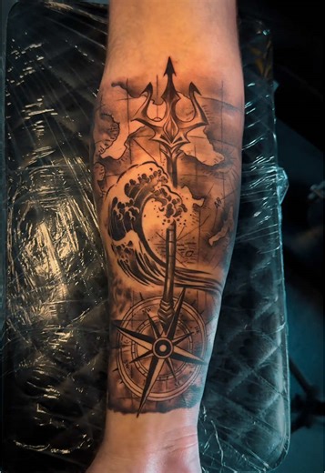 Exploring Travel Tattoos: Trident and Compass Designs