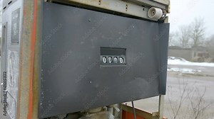 The number rolls of the broken gas pump machine on the abandoned gasoline station
