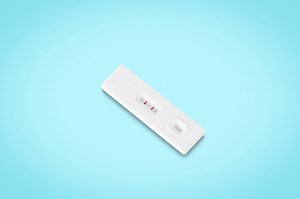 covid-19 positive test result. antigen test kit​ isolated on​ light...