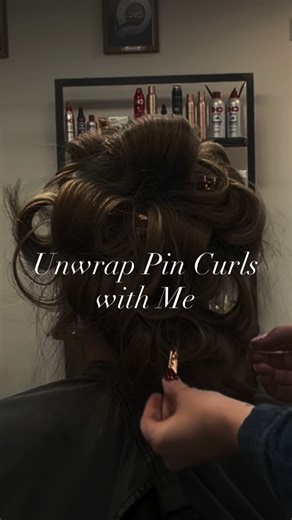 SARAH RANDAZZO •HAIRSTYLIST• CENTRAL, PA on Instagram: "Something so satisfying about unwrapping pin curls 🫦 To do this at home all you need is a round brush, pin curl clips, and your favorite products. •I use Redken Quick Blowout, Chi Silk oil, and Matrix Wonderboost hair spray for this look. •Dry your hair to about 80%, then take big sections to dry in your round brush (it takes practice!) •You can also use an air wrap tool! I recommend from @ariabeauty for at home. (Link in bio SarahHairArt 