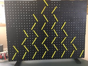 Three dozen servos create animated artwork | Arduino Blog
