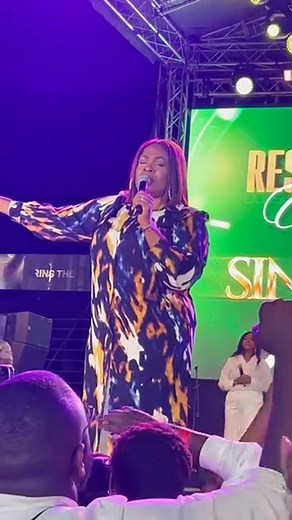 Gospel Singer Sinach performing for the Project Never Walk Alone Restoration Concert. | Idah Elke