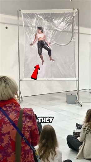 This Art Traps a Human Between Plastic 😳