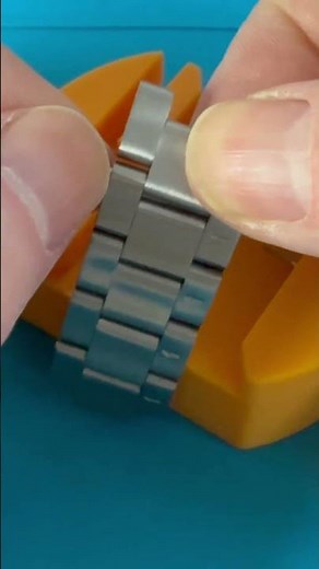 How to use a watch bracelet adjustment tool.