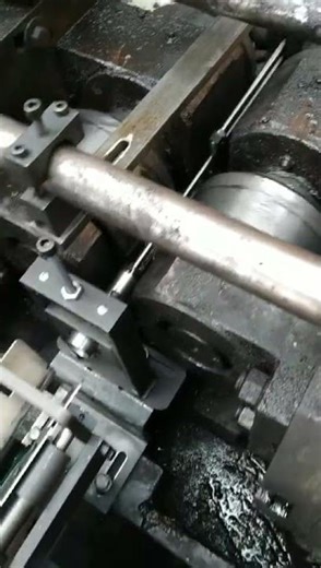 automatic loading machine for thread rolling machine.