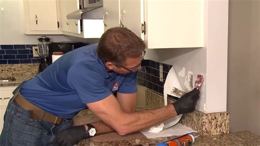 Stick-on your own tile backsplash, but use some glue!