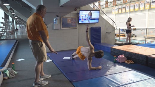 UT diving coach speaks on Olympics while showing what it takes to dive off of a 3-story building