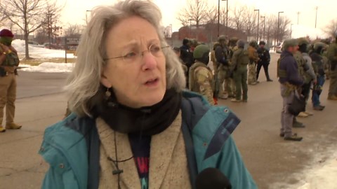 Tensions high outside Minneapolis federal building after fatal ICE shooting