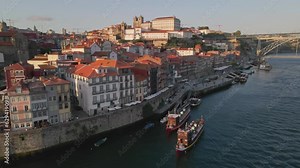Ribeira do Porto Aerial Reveal, historic oldtown at sunset, Portugal - Aerial