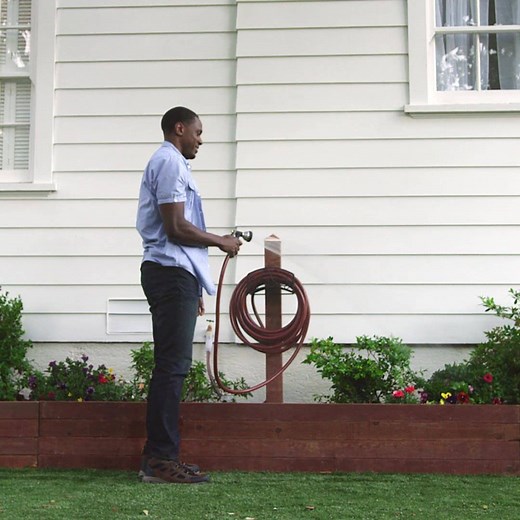 Tidy up your yard by storing your garden hose! DIY or buy a garden hose reel today. | Lowe's Home Improvement