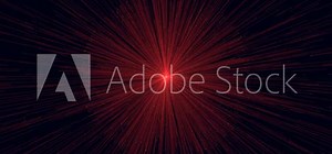 Vibrant red light bursts from the center, radiating energy and power in all directions. The mysterious image captivates with its fiery intensity and open ended meaning