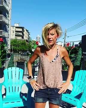 Woman Pours Bucket of Water on Herself While Telling Ways to Deal With Heat - 1208361