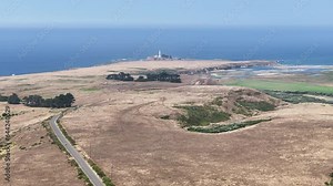 Aerial Point Arena northern California toward lighthouse 2. Lighthouse in Mendocino County, California. Built to warn ships and navigators of rocks. California coastline north of San Francisco.