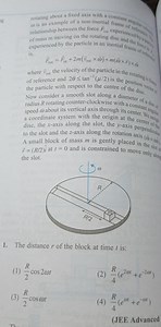 rotating about a fixed axis with a constant angulay . \omega is... | Filo