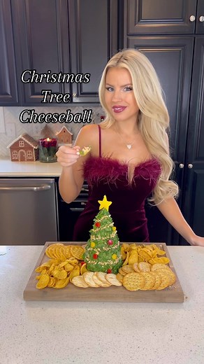 Christmas Tree Cheeseball!🎄 So delicious, and super cute! This will be the hit of your holiday parties coming up! 🧀♥️ Ingredients: 2 blocks cream cheese 4 cups shredded cheddar 3/4 cup rotel (drained) 6 sliced bacon (cooked and crumbled) 1/2 cup green onion (sliced) Salt & Pepper Topping: 1 bunch chopped cilantro Pine nuts Red & yellow bell pepper Fritos Scoops & crackers for serving Directions: 1. Mix first ingredients together in a large bowl until combined. Mold into a tree. 2. Cover with c