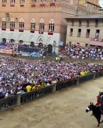 Palio di Siena 🏇 Every year, 40,000 passionate attendees gather in Piazza del Campo to watch this traditional horse race. The Palio di Siena is one of Tuscany most thrilled and anticipated summer events — taking place on July 2nd and August 16th in 2024. 👉 Start planning this year's getaway: bit.ly/3SowQMO 📹 IG: martatrefoloni | See Italy Travel