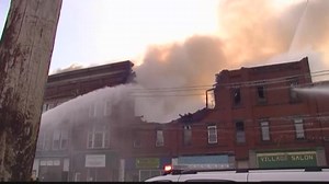 Fire crews battle large fire in Falconer