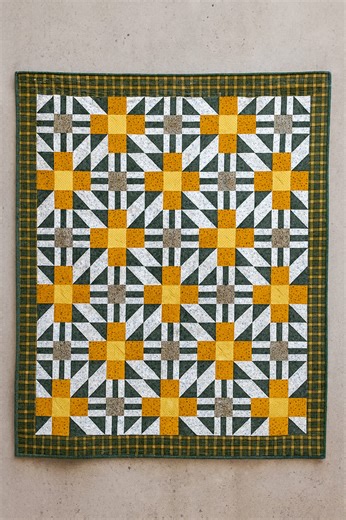 Simple, fun, and oh-so cozy! 🧵⭐ This 9-patch quilt block finishes at 9″ square. ⭐Make 15 of each block add a 4″ border, and you’ll have the perfect 53″ × 62″ throw quilt! 💛 #QuiltingForBeginners #QuiltBlock #PatchworkQuilt #DIYProjects #madewithlove | FabricStacks