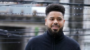 A happy Brazilian man laughing and smiling portrait face