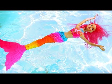 Barbie Mermaid and Barbie doll at the swimming pool