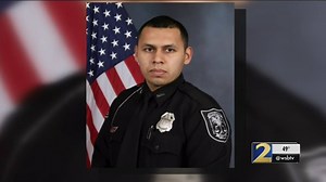 Law enforcement escorts fallen DeKalb County officer on his final trip home