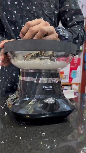 Electric coconut scraper