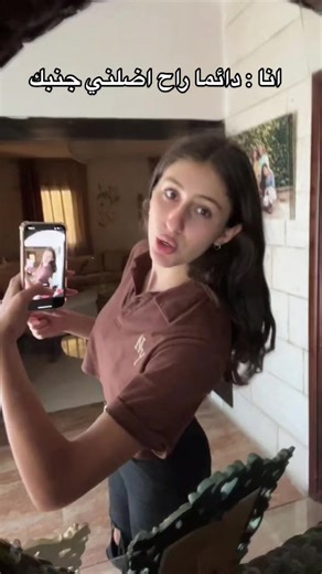 Young Woman Enjoys Meal and Captures Selfie at Home
