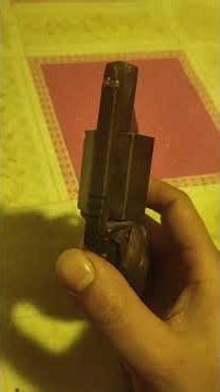 A homemade revolver with a manually operated dial wheel and no mechanical mechanism.