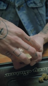 Stock Video Man Grinding Weed In A Grinder Animated Wallpaper