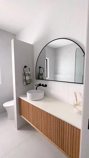 13K views · 26 reactions | Did you see that niche and bench space?  Function and flow are at the forefront of this design. Contrasting black tapware makes a bold statement against the light greys and warm timber finishes.  @valleyfarmhousereno #bathrooms #bathroom #bathroominspo #bathroominspiration #bathroomideas | Reece Bathrooms | Facebook