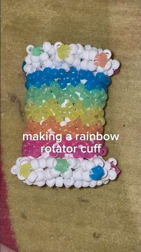 rainbow rotator cuff! YES I did use this audio lmfao #kandi #rotatorcuff #rainbow #bome #kandikid