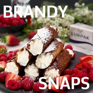 Turn that whisk into a wand and weave some magic in the kitchen this season. Put your powers to the test with these irresistible Brandy Snaps, filled with a decadent Chantilly Cream. https://bit.ly/3f7z5j4 | Lurpak