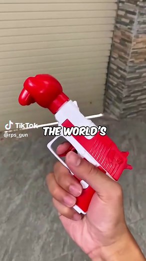 Practice your aiming and reduce anxiety with this 🪨📄✂️ fidget gun