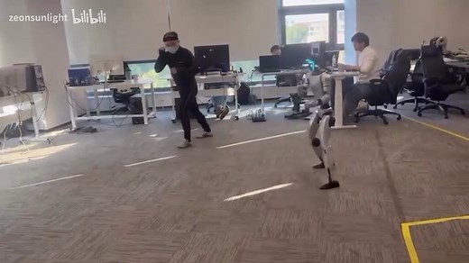 Eye-watering moment man is kicked in the groin by a robot