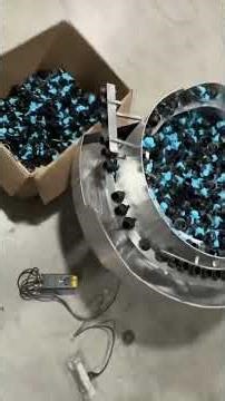 How to automatically feed parts into the assembling machine vibratory bowl