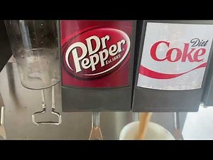 The buzzing sound of the Diet Coke soda fountain dispenser at Kalihi McDonald’s