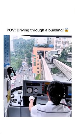 Driving a train through a residential building in Chongqing, China! 🚝🏢📝