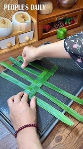 6.8M views · 29K reactions | Solve this Rubik's Cube Zongzi on the #DragonBoatFestival. | People's Daily, China | Facebook